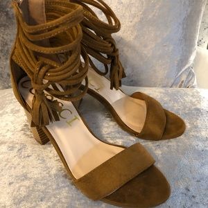 So cute brown suede sandals.